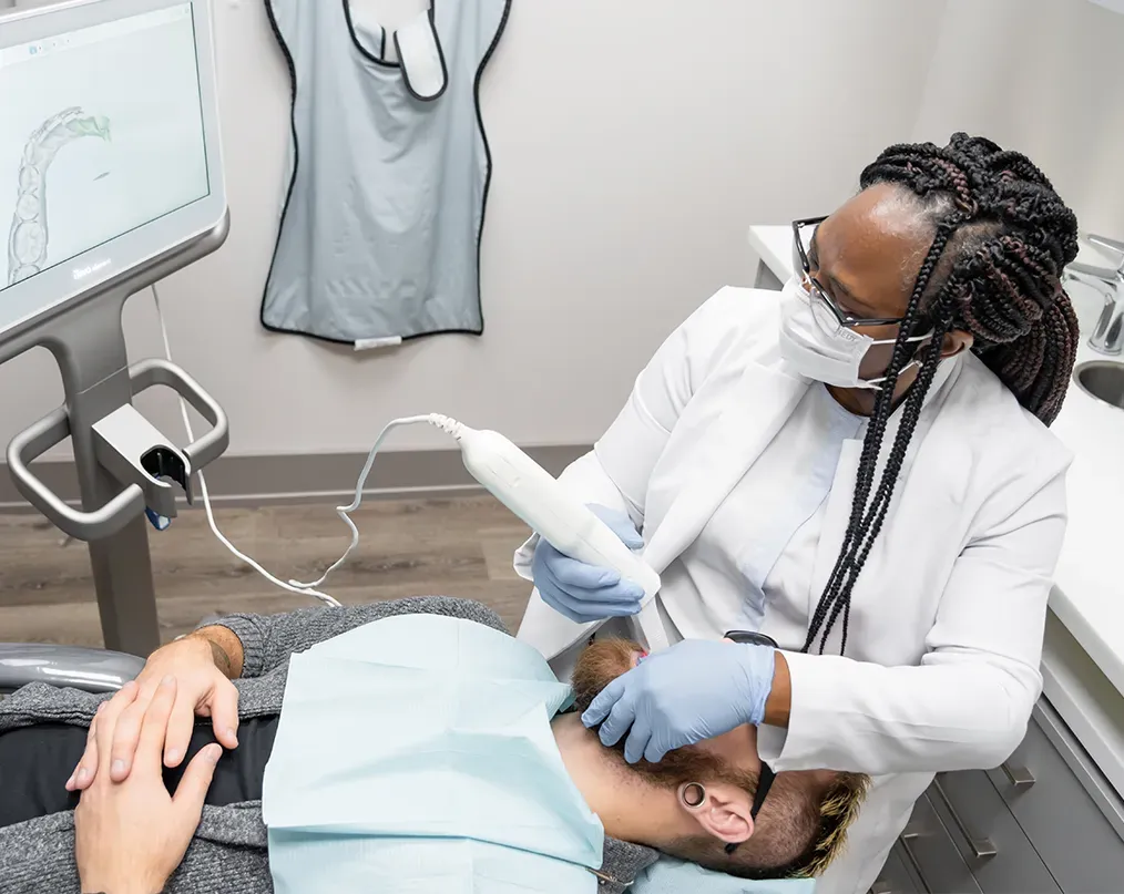 Dr. Osih performing oral scan